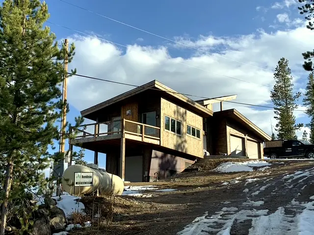 Modern shed-roof custom home with attached garage in Grand County, Colorado