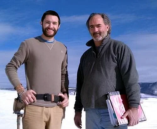 Geof Rondeau and his son on a snowy jobsite in Grand County, Colorado